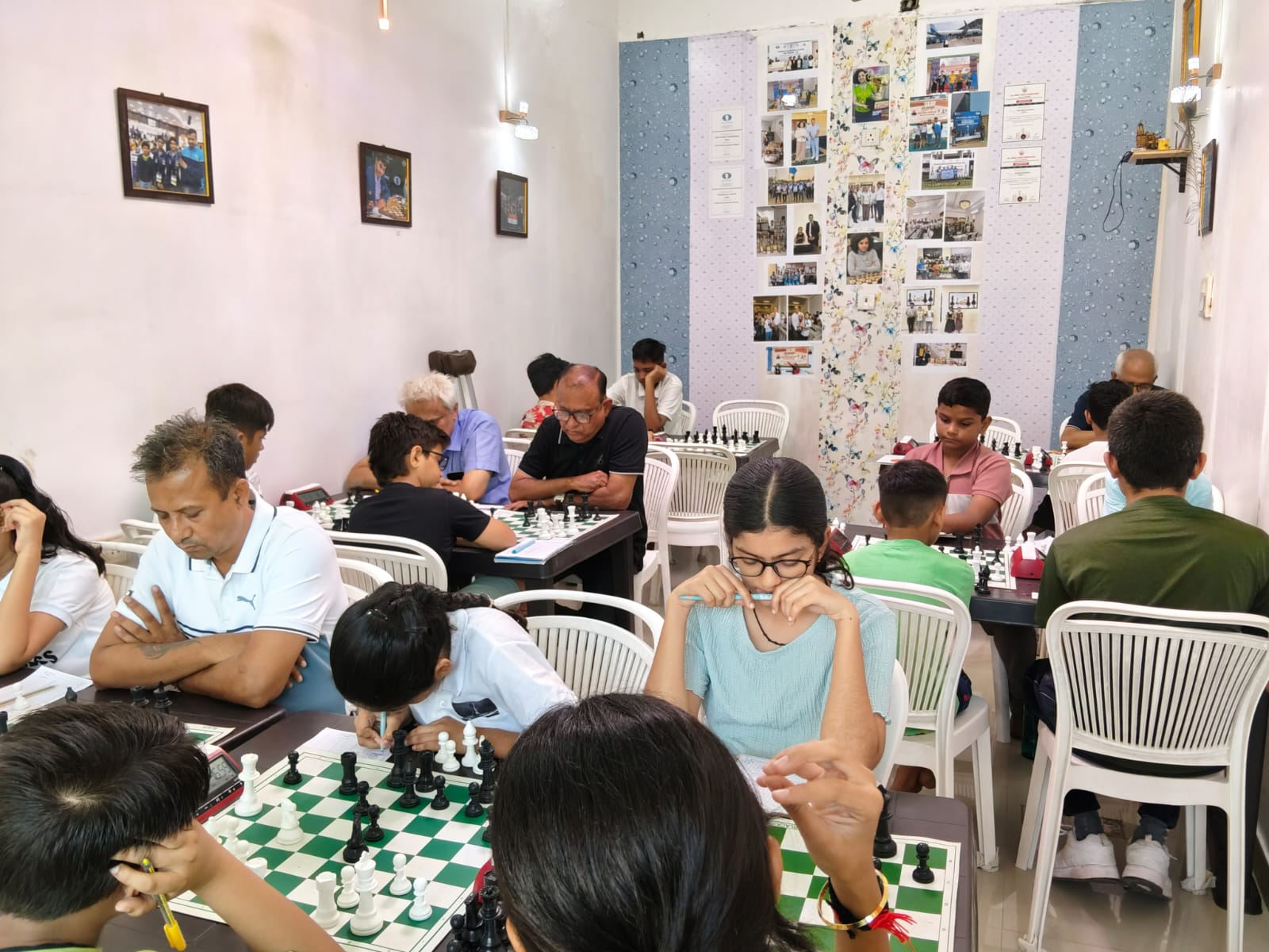Students of all ages playing chess at Knight Chess Classes